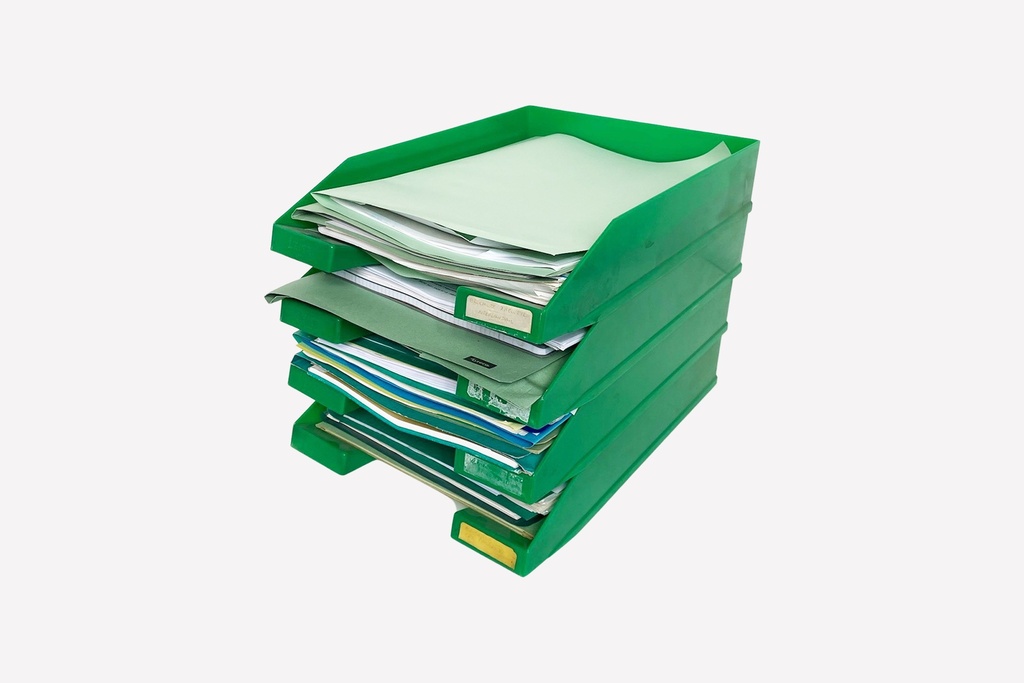 Stacked Green Document Trays Filled With Papers