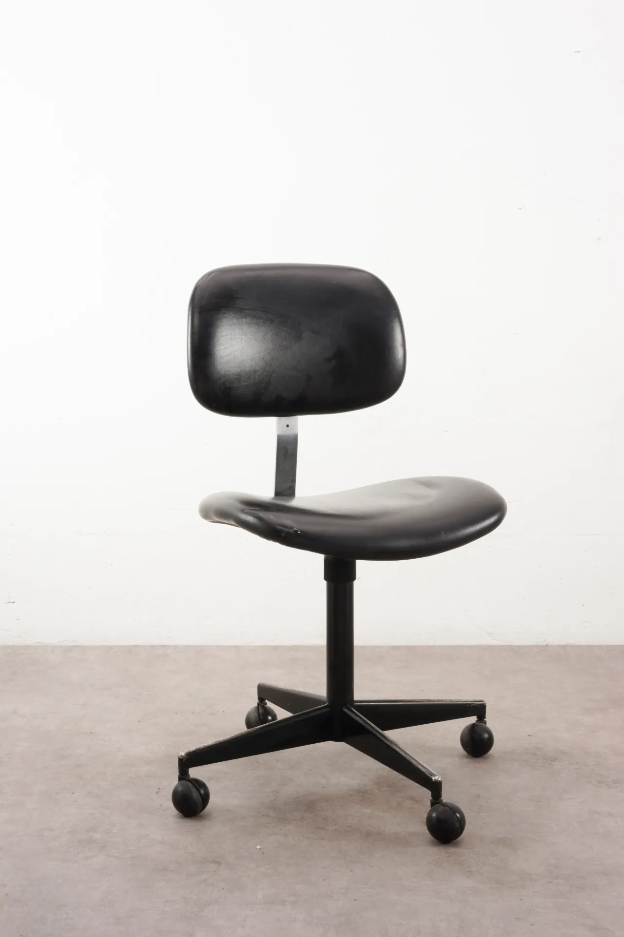 Vintage Black Vinyl Office Chair on Casters