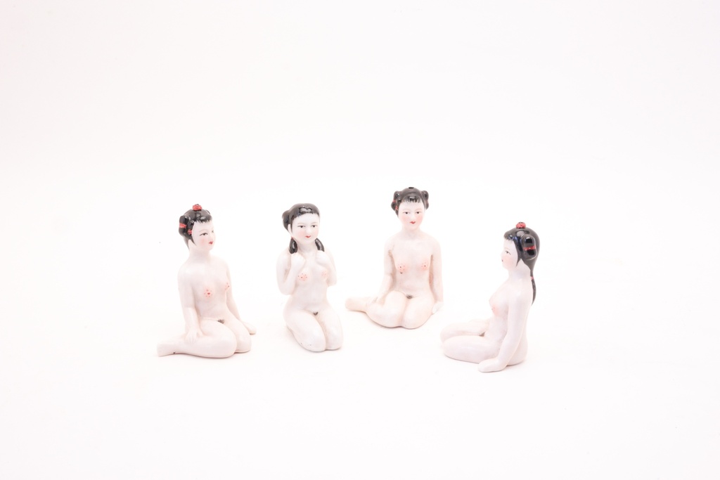 Porcelain Seated Female Figurines with Traditional Hair Accessories