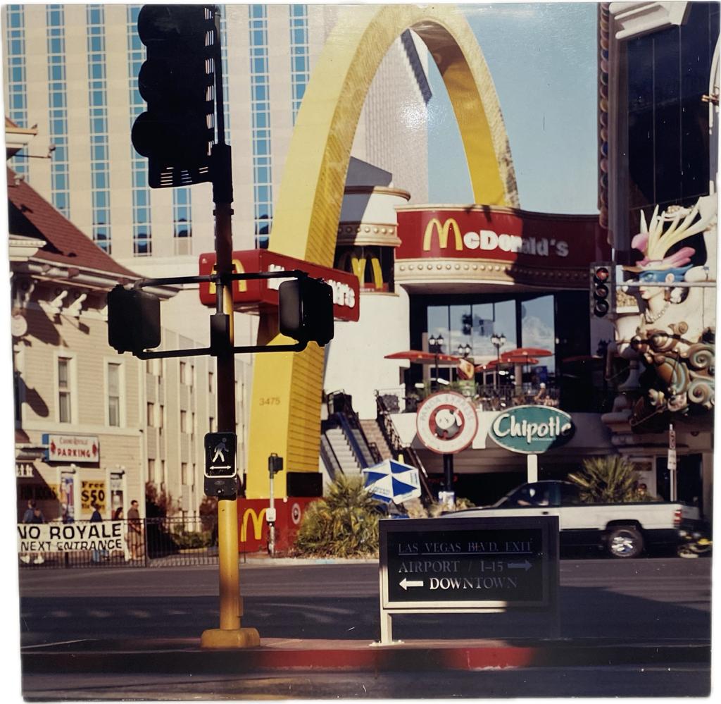 Las Vegas Street with McDonald's and Chipotle Neon Signs