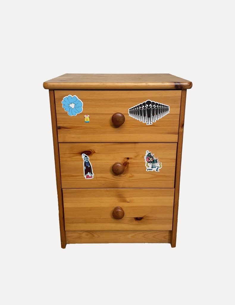Pine Three-Drawer Dresser with Assorted Stickers