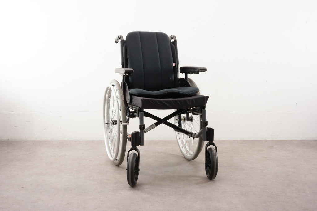 Classic Black Wheelchair on Neutral Background