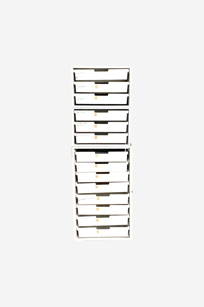 White Modular Storage Drawer Unit with Handwritten Labels