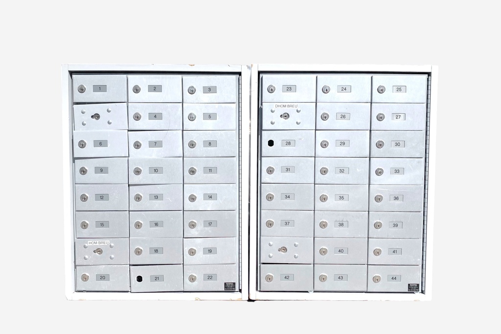 Wall-Mounted Metal Mailbox Unit with Numbered Compartments