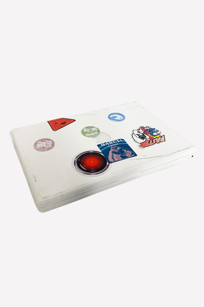 White Laptop with Sci-Fi and Cartoon Stickers
