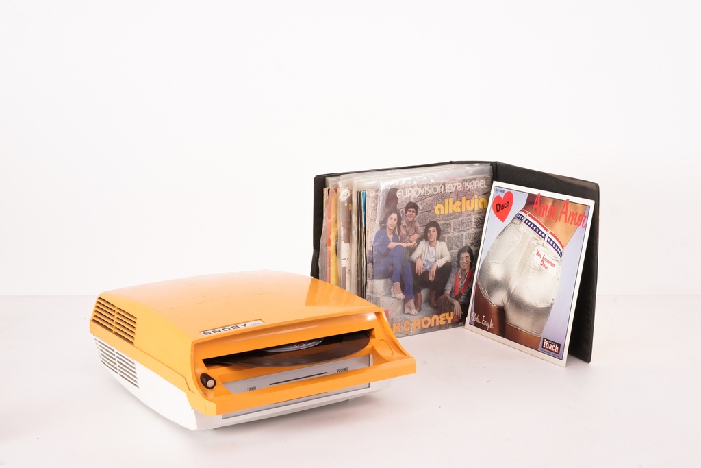 Retro Vinyl Record Player with Album Collection