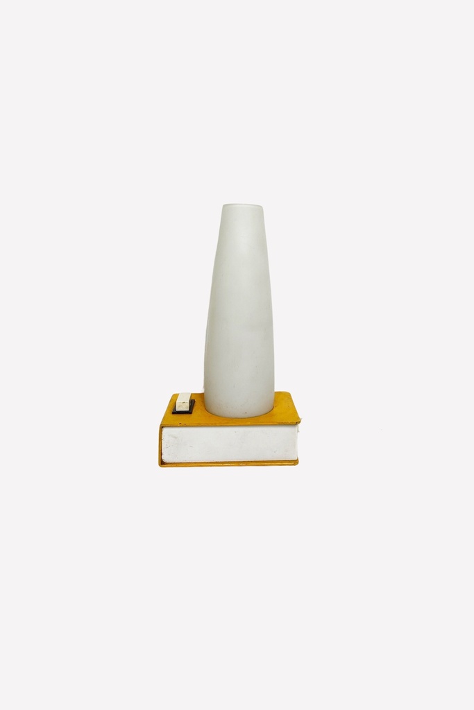 Minimalist White Vase on Yellow Book Display