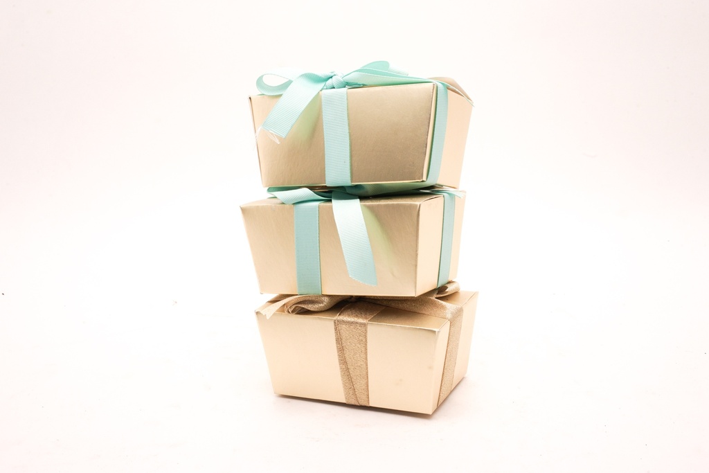 Stacked Gold Gift Boxes with Blue and Gold Ribbon