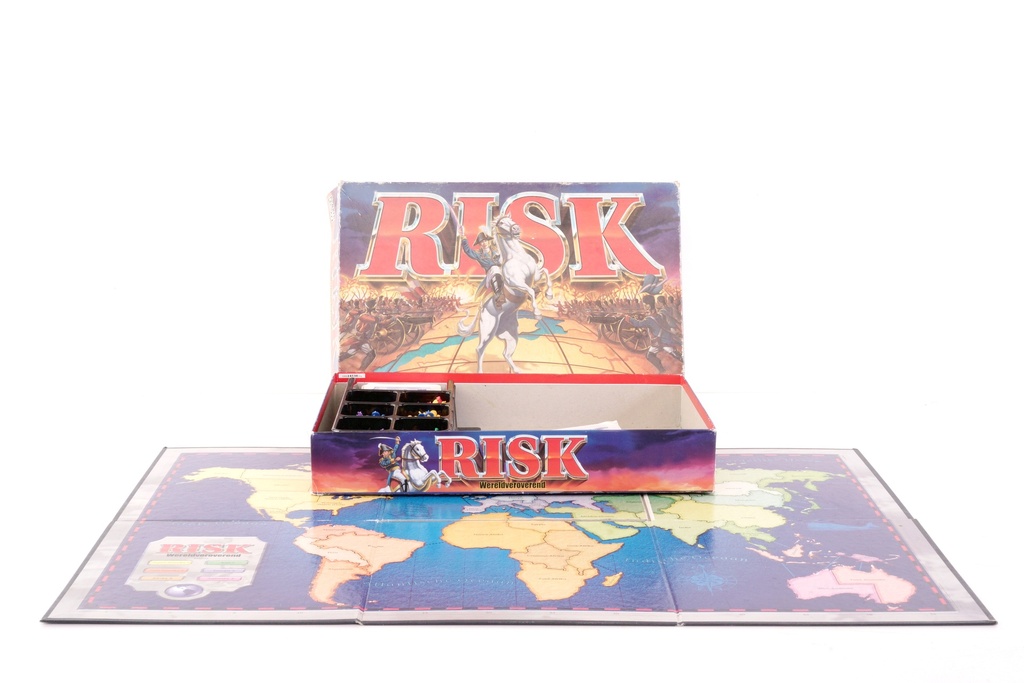 Classic Risk Board Game Setup with Box and Map