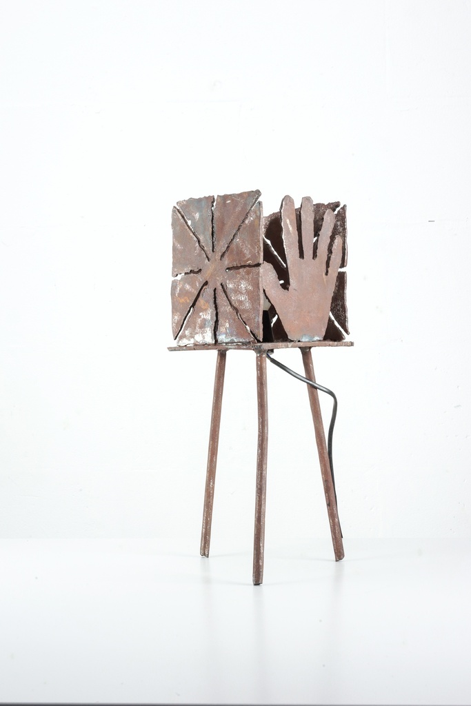 Rustic Metal Hand and Geometric Pattern Sculpture on Tripod