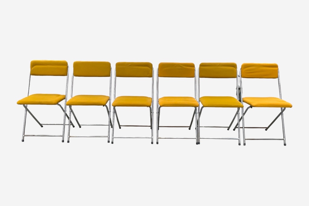 Six Yellow Folding Chairs in a Row
