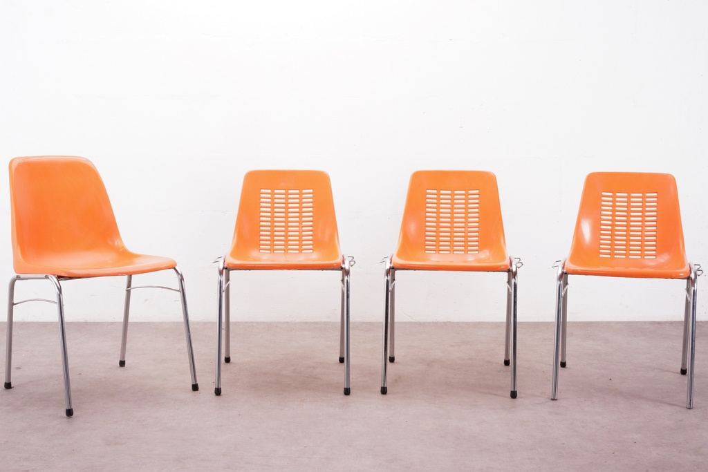 Retro Orange Stackable Chairs with Chrome Legs