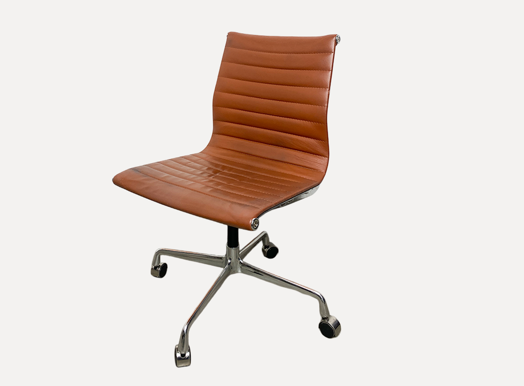 Brown leather chair Eames EA105