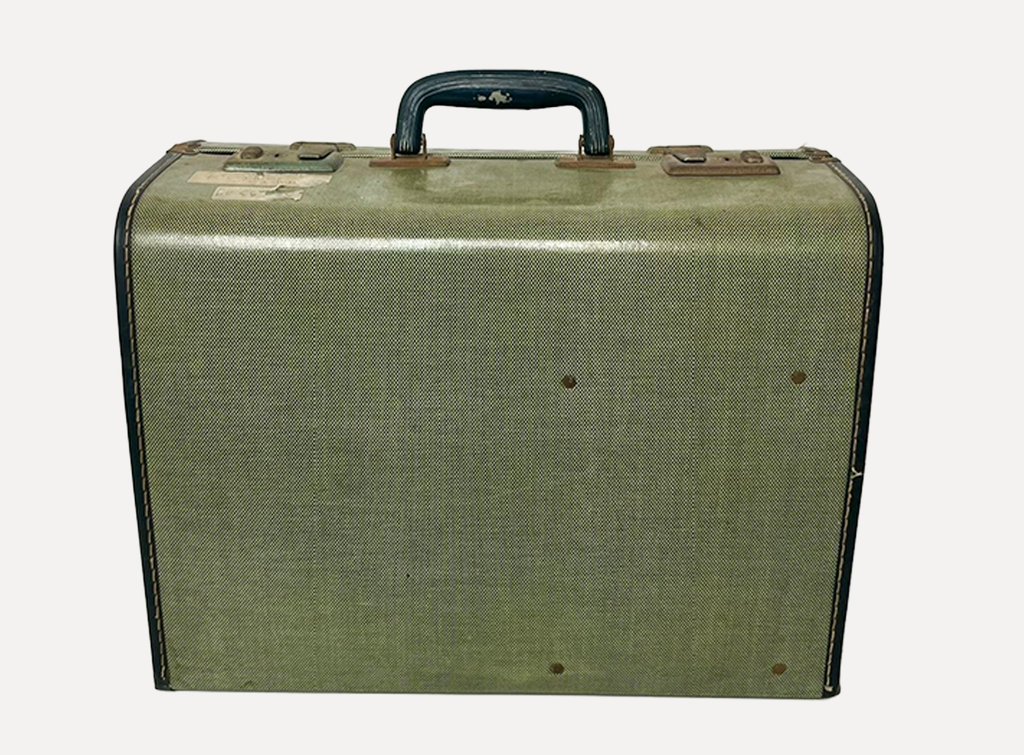 Sewing Machine In Green Plastic Suitcase
