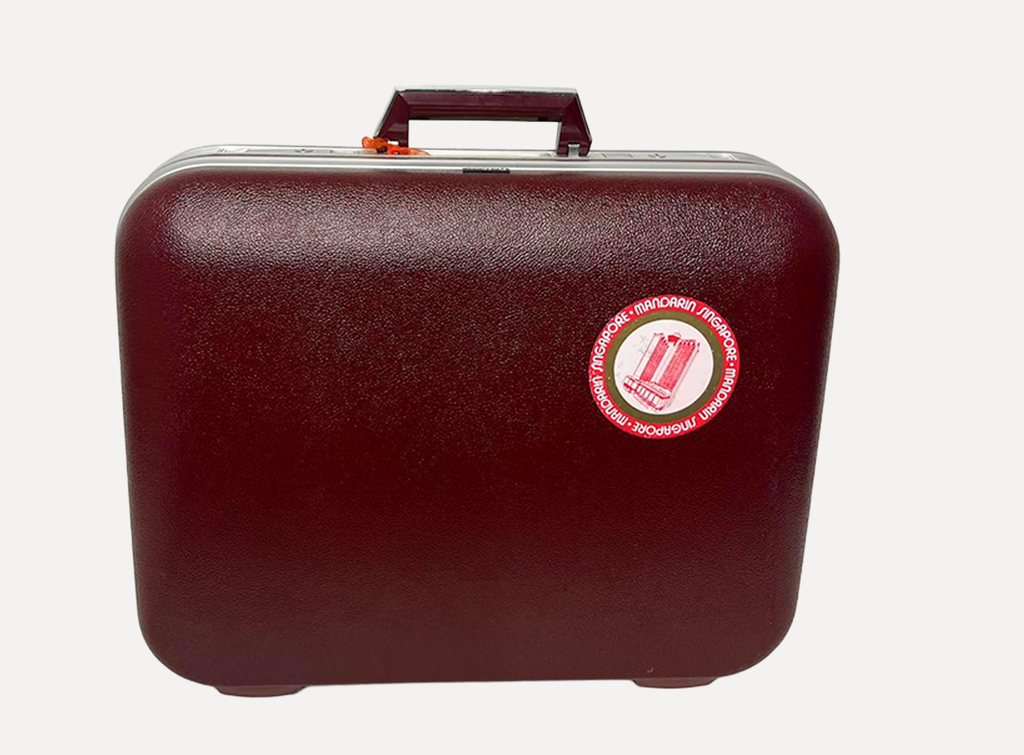 Red Plastic Trunk Bag