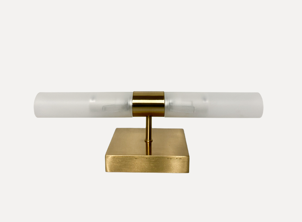 Gold And White Table Lamp WIth TWo Long Cylinders On The Sides