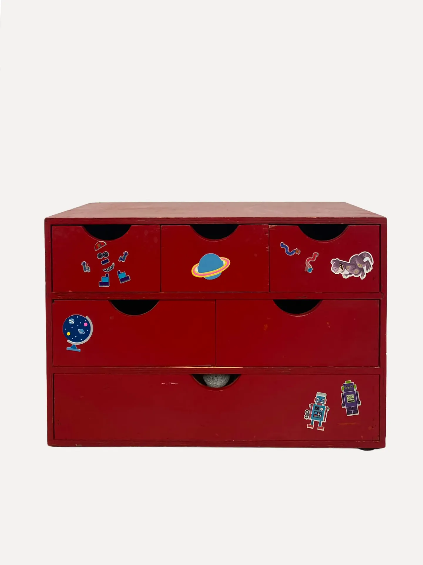 Red Sticker-Covered Storage Chest