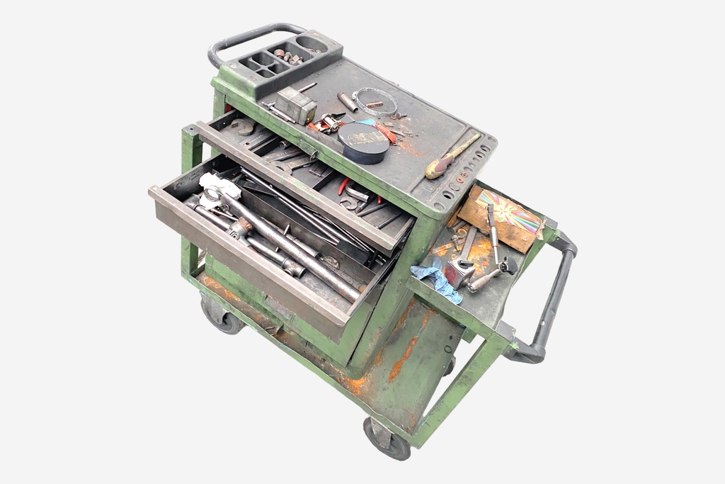 Weathered Industrial Tool Cart with Open Drawers and Assorted Mechanics' Tools
