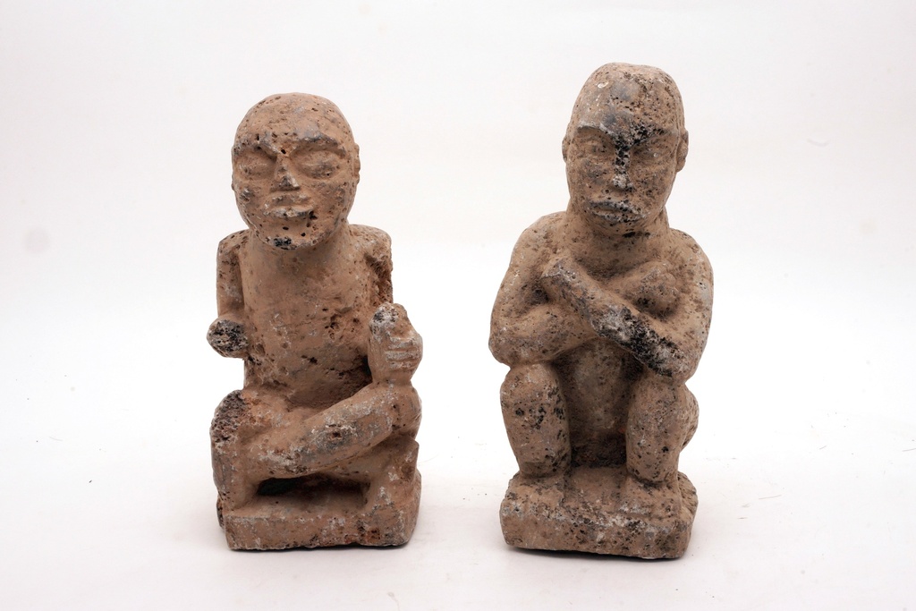Rustic Stone Figurines in Sitting Pose