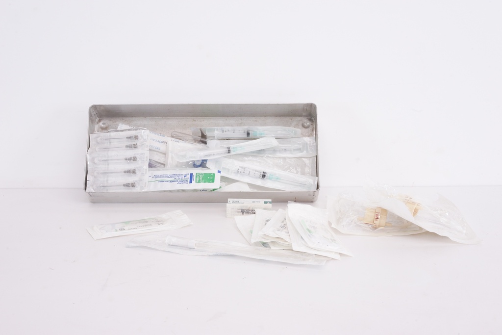 Sterile Syringes and Medical Supplies in Metal Tray