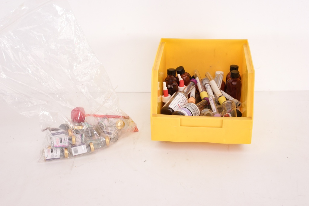 Medical Supplies in Yellow Storage Bin with Plastic Bag