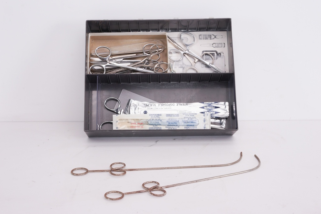 Surgical Instruments and Sterile Scalpel Kit in Organizer Box