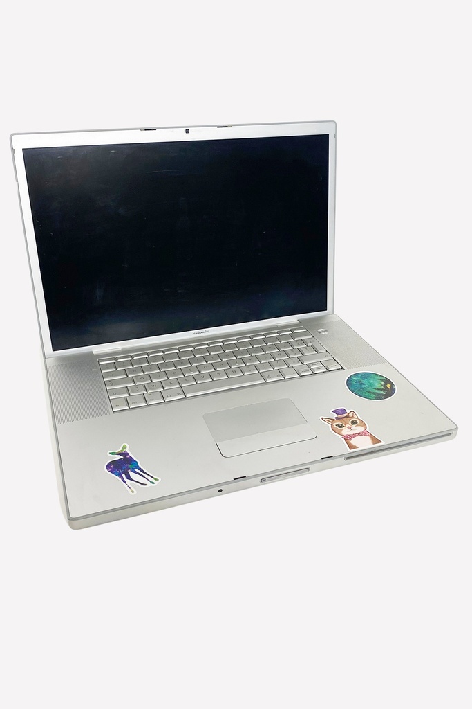 Vintage Silver Laptop with Quirky Stickers