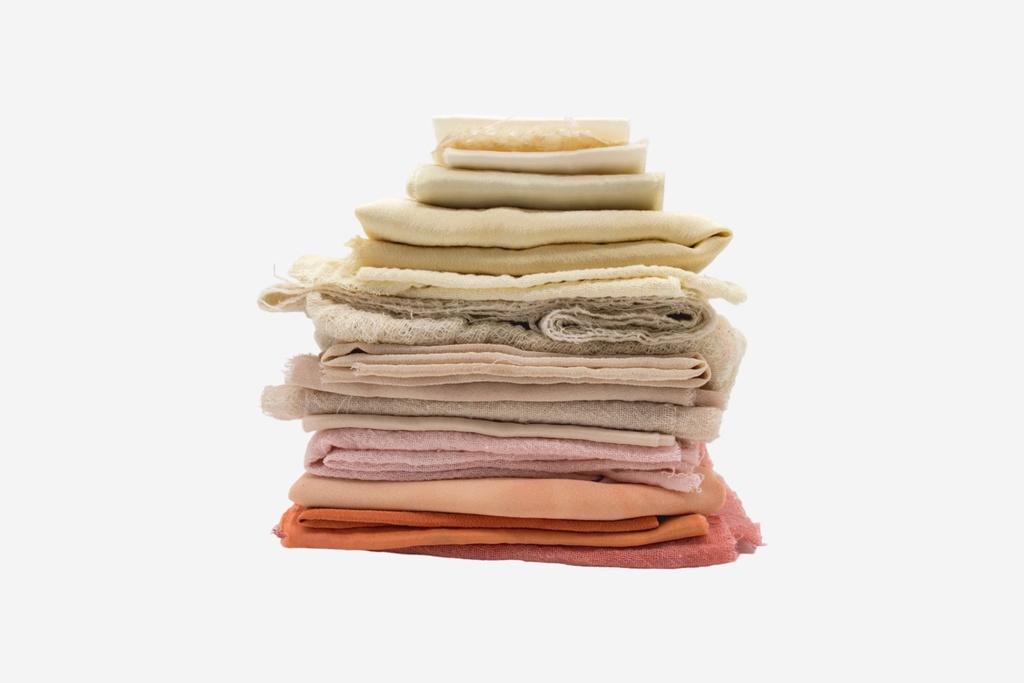Stack of Neutral and Pastel Fabric Layers