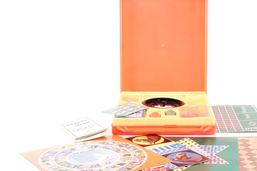 Vintage Board Game Roulette Set with Colorful Cards and Game Pieces
