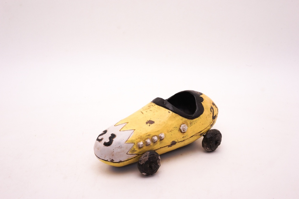 Vintage Yellow Shoe Racer Toy