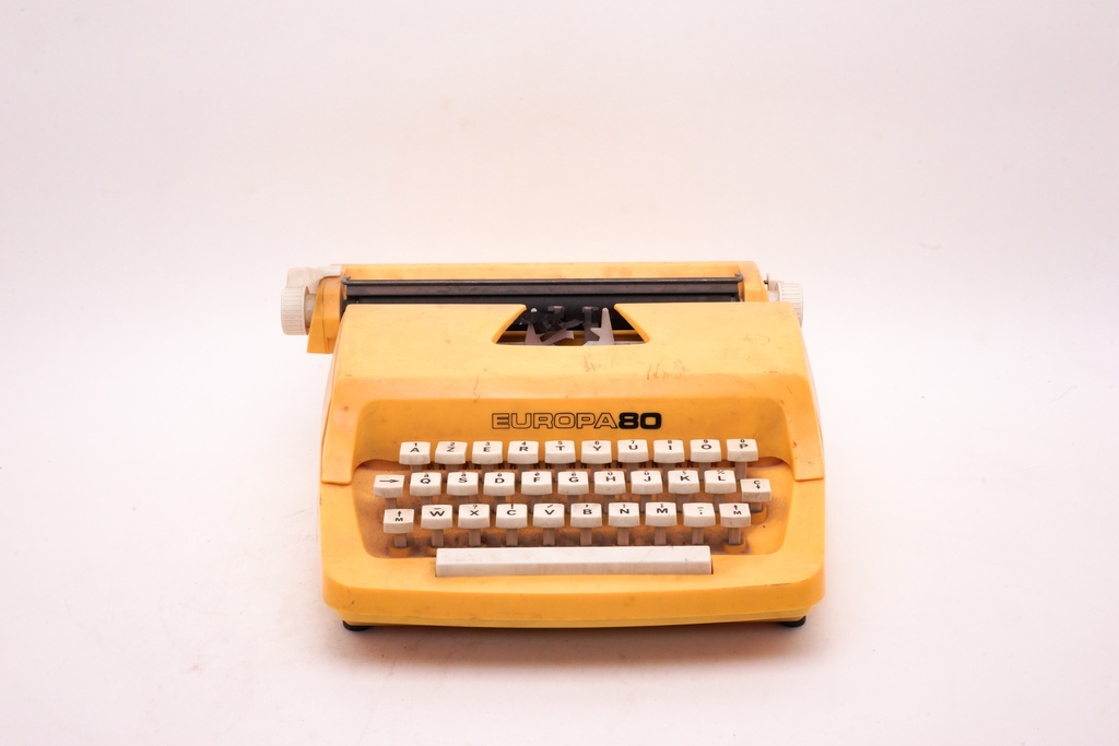 Vintage Yellow Europa 80 Typewriter
